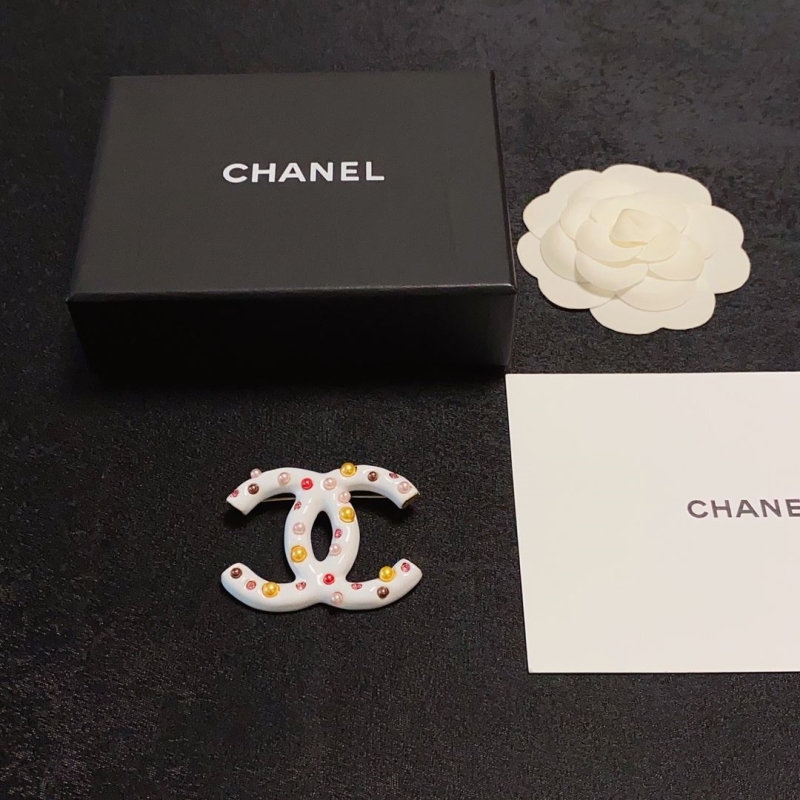 Ch**el brooches